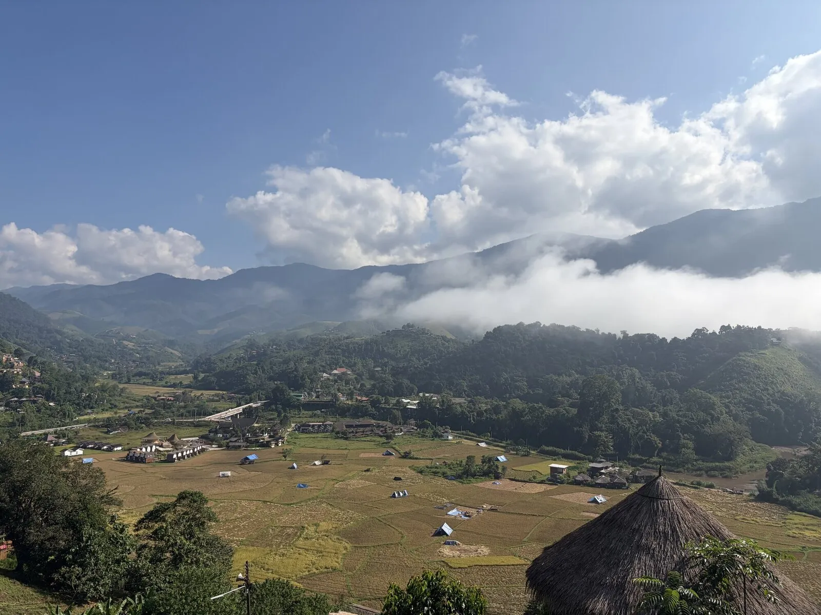 Mist hanging over a mountain village in the early morning