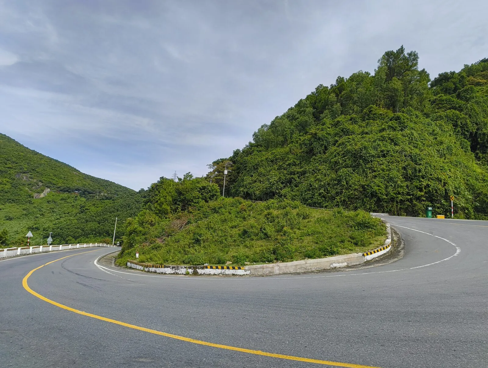 A hairpin bend on the Hai Van Pass with a yellow centre line